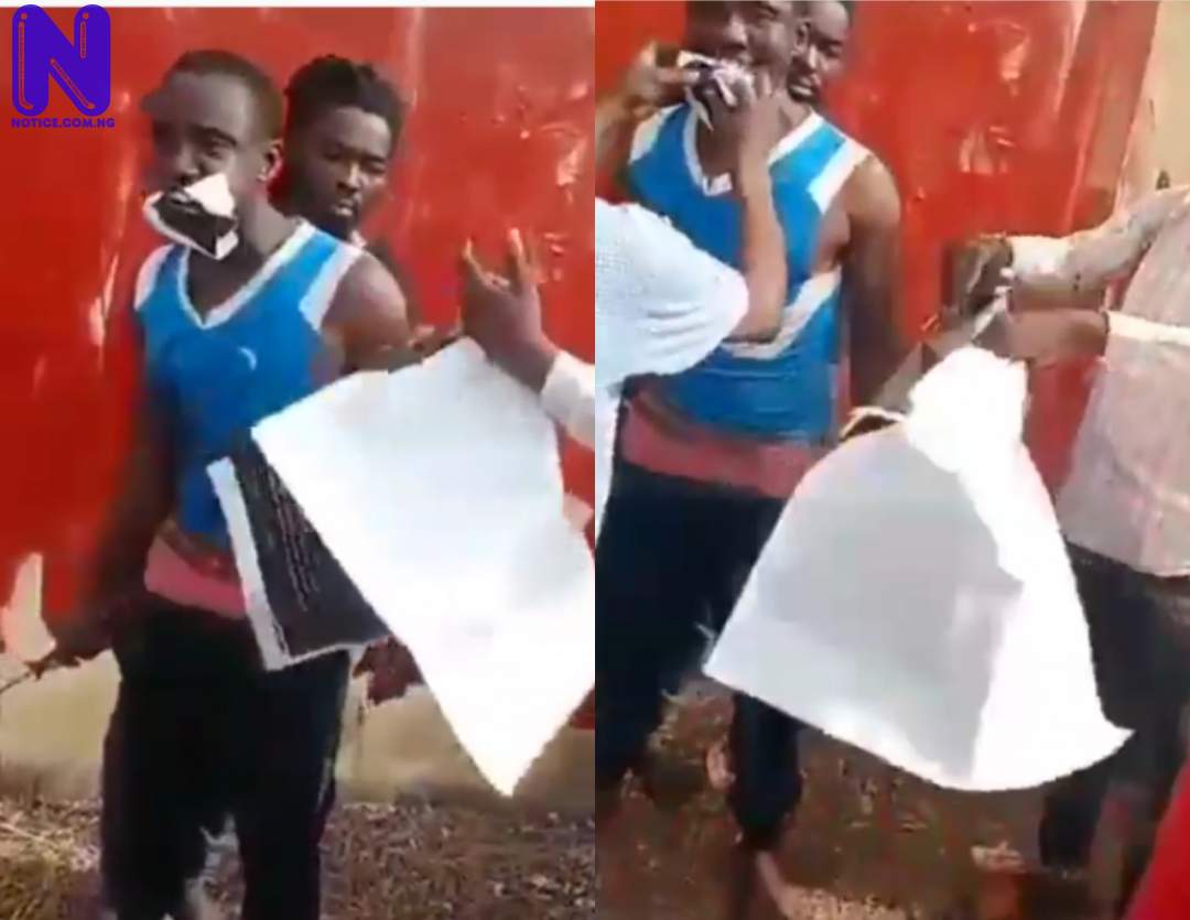 Nigerian youths forced to eat ‘Buhari Must Go’ posters in Kogi (VIDEO) EY85R7CV